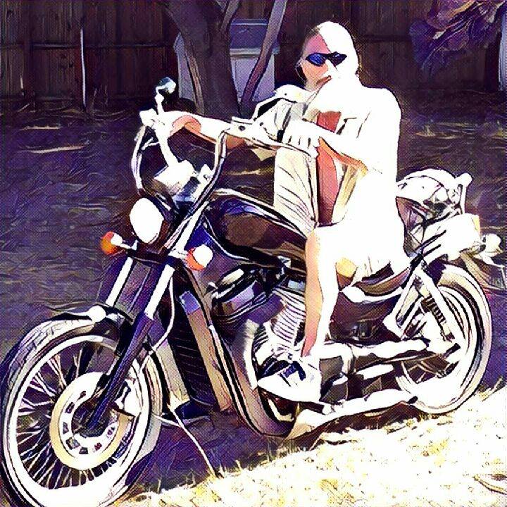 GuerrillaGuru On Motorcycle